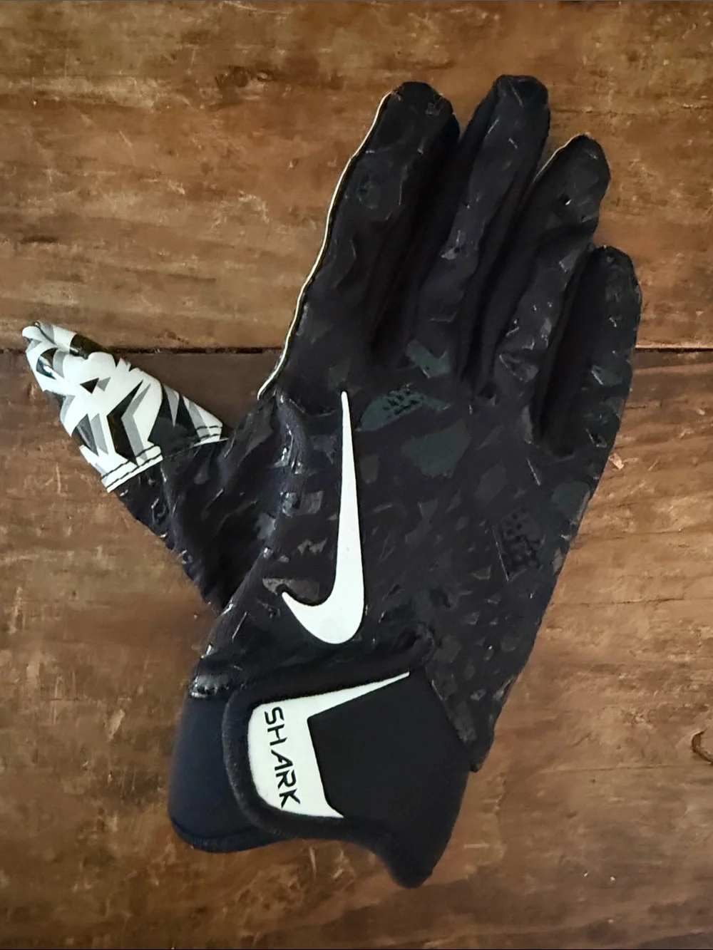 Nike Black Youth Shark Football Gloves with White Swoosh